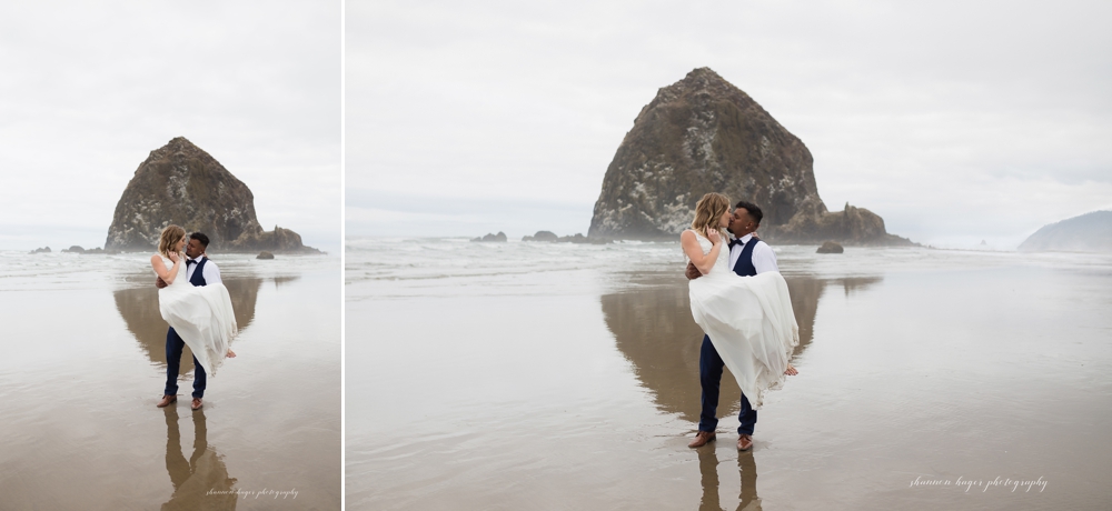 wedding couple in front of haystack rock at their cannon beach wedding