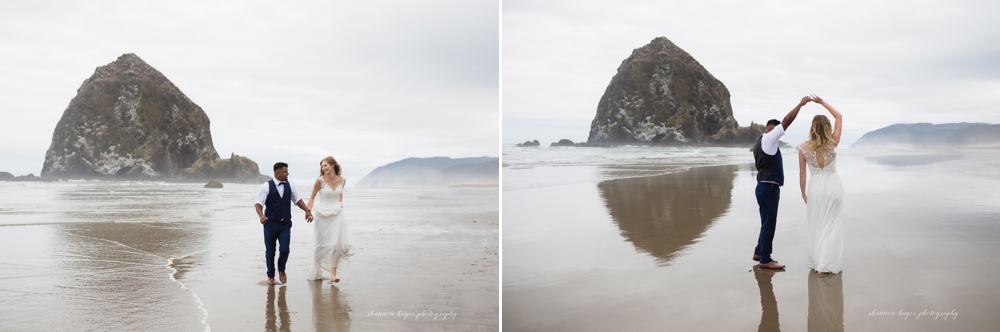 wedding couple in front of haystack rock at their cannon beach wedding