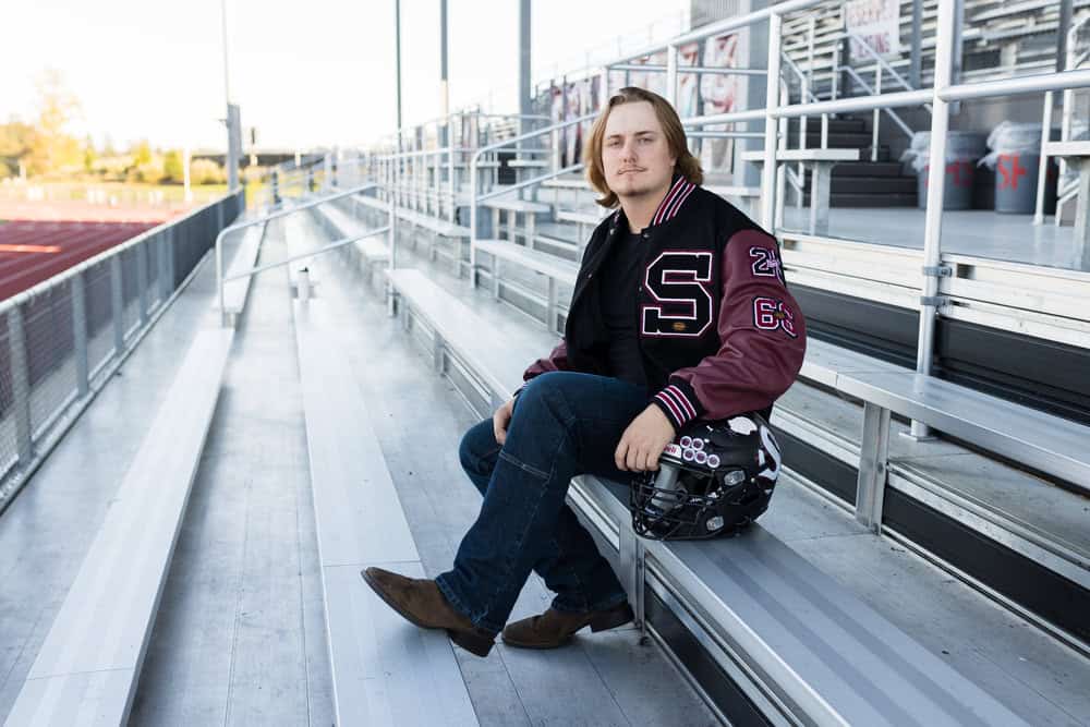 sherwood football senior photo in stands