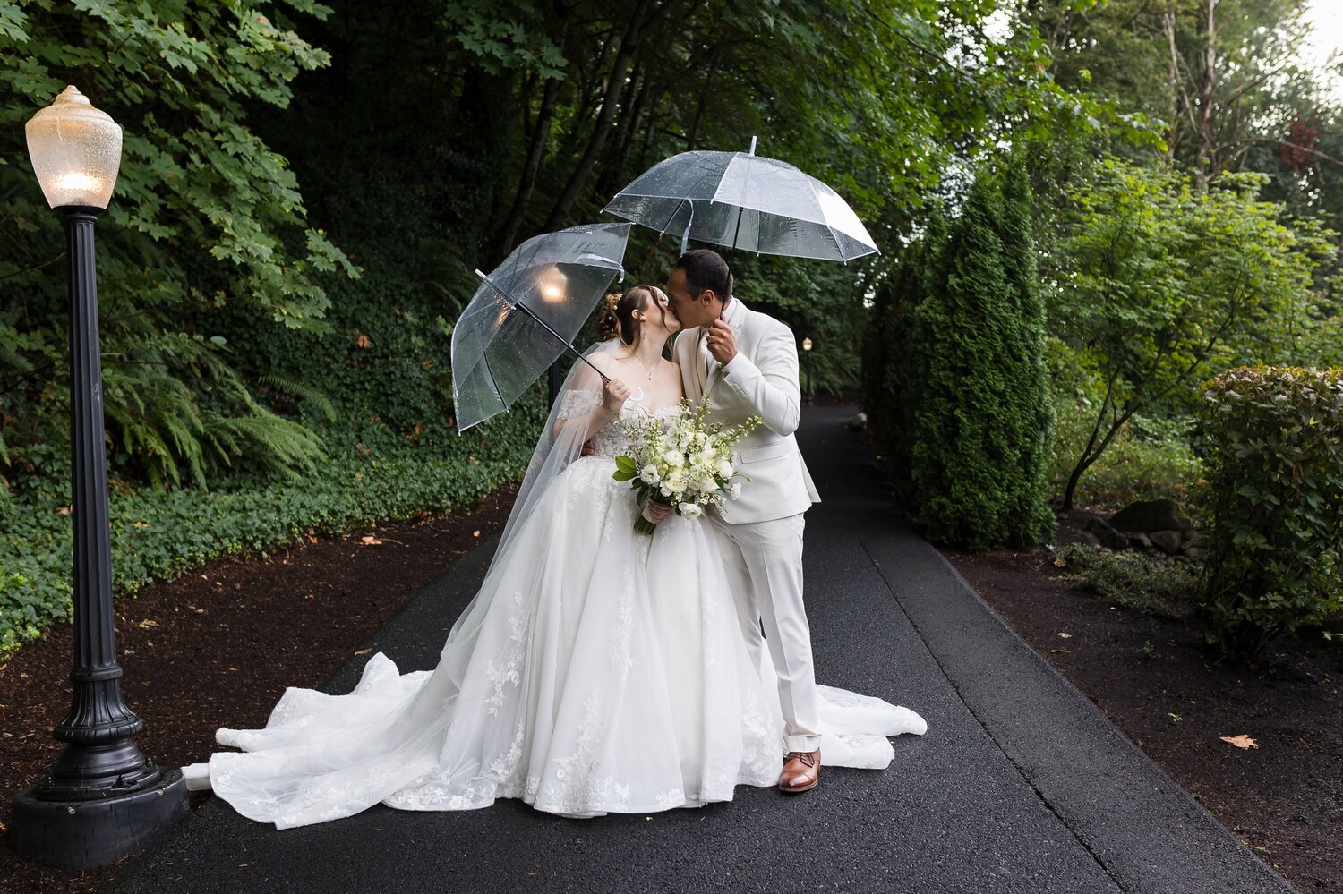 bride and groom photos with umbrellas